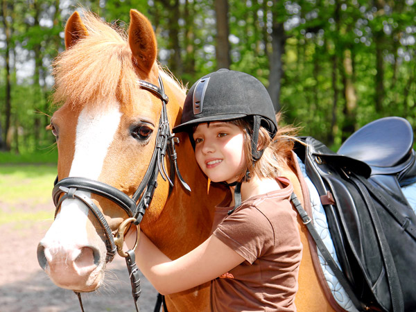 Mädchen mit Pferd