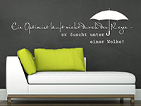 Wandtattoo Spruch Optimist in weiÃŸ im Wohnzimmer