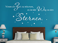 traumhaftes Sterne Spruch Wandtattoo über dem Bett