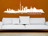 Toronto Skyline Wandtattoo in weiß auf dunkler Wandfläche