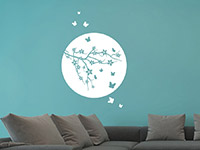 Wandtattoo Kreisornament mit Blütenzweig im Wohnzimmer in weiß