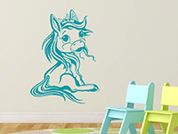 Wandtattoo Sitzendes Pony im Kinderzimmer in türkis