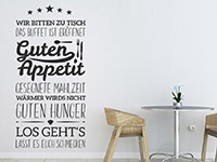 Spruchband Wandtattoo Guten Appetit mit Sternen auf heller Wandfläche