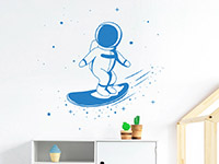 Wandtattoo Kleiner Astronaut Sternensurfer im Kinderzimmer