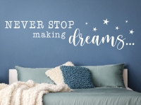 Never stop making dreams Wandtattoo auf dunkler Wand