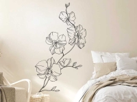 Filigranes Orchideen Wandtattoo im Schlafzimmer