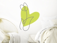 Wandtattoo Line Art Blume mit Herz im Schlafzimmer