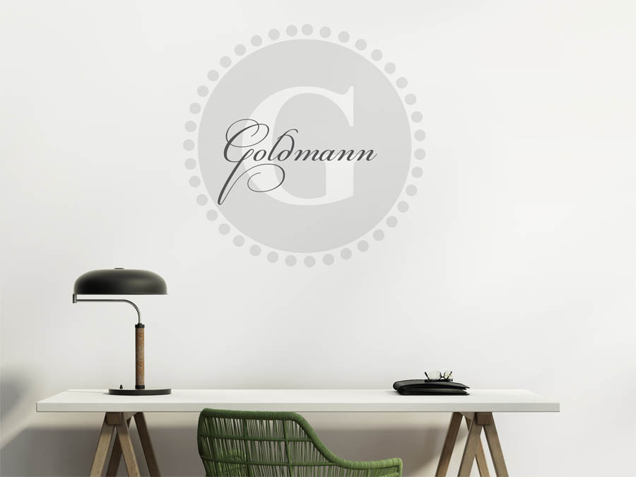 Goldmann Familienname als rundes Monogramm