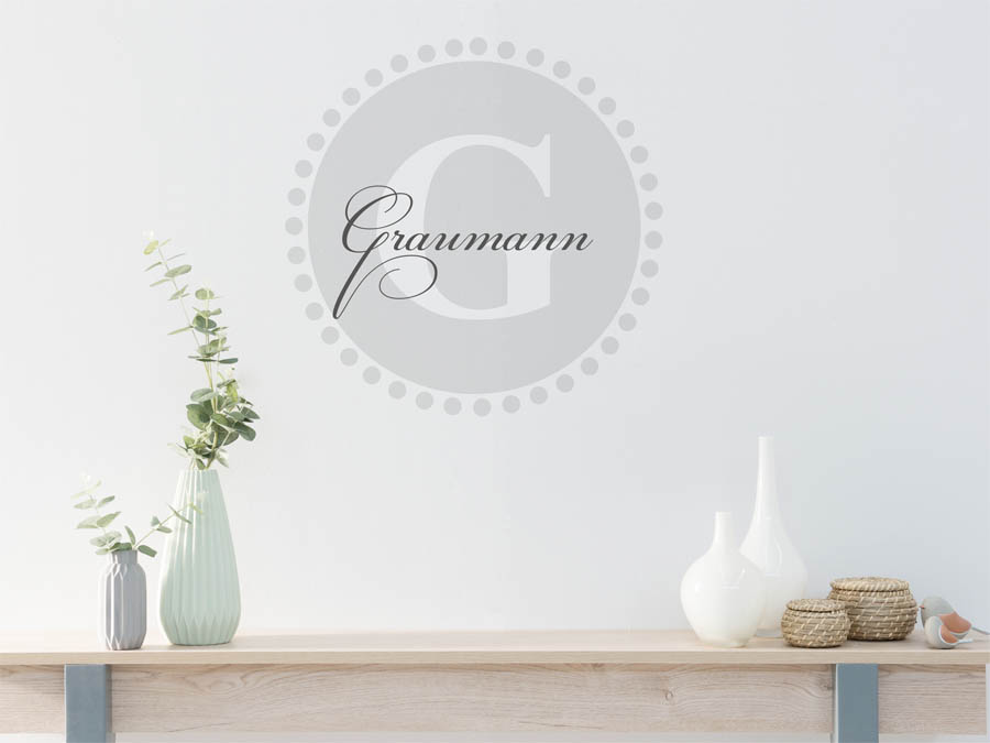 Graumann Familienname als rundes Monogramm