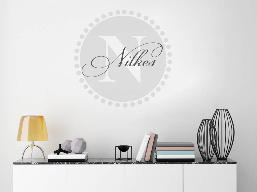 Nilkes Familienname als rundes Monogramm