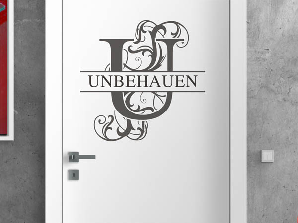 Wandtattoo verschnörkeltes U mit Unbehauen