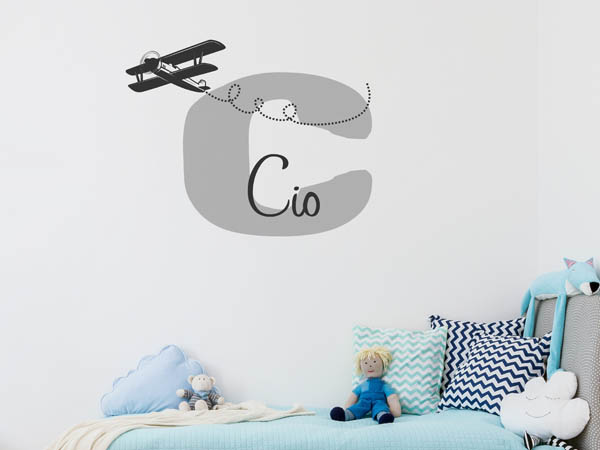 Wandtattoo Cio mit Flugzeug