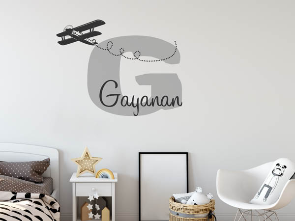 Wandtattoo Gayanan mit Flugzeug