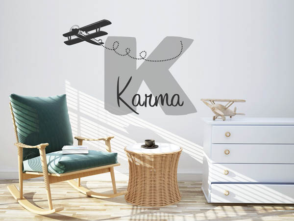 Wandtattoo Karma mit Flugzeug