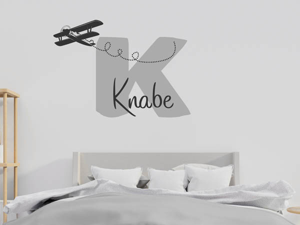 Wandtattoo Knabe mit Flugzeug
