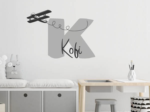 Wandtattoo Kofi mit Flugzeug