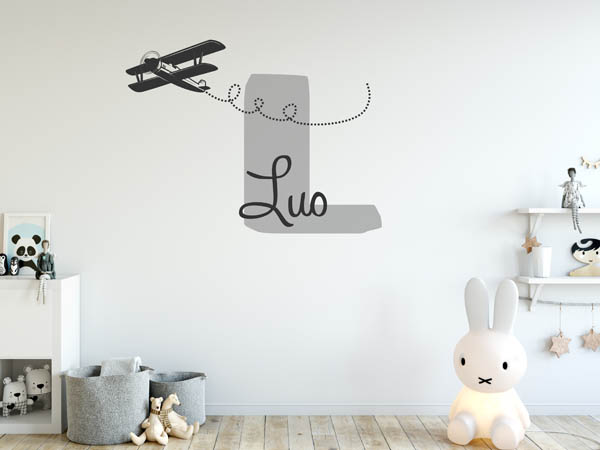 Wandtattoo Luo mit Flugzeug