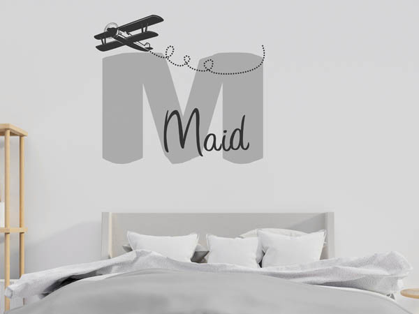 Wandtattoo Maid mit Flugzeug