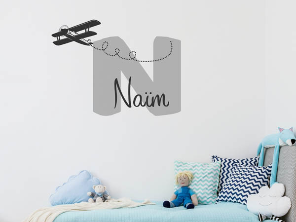 Wandtattoo Naïm mit Flugzeug