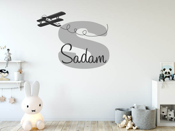 Wandtattoo Sadam mit Flugzeug