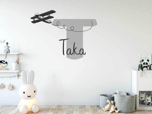 Wandtattoo Taka mit Flugzeug