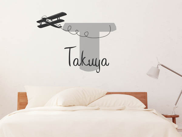 Wandtattoo Takuya mit Flugzeug