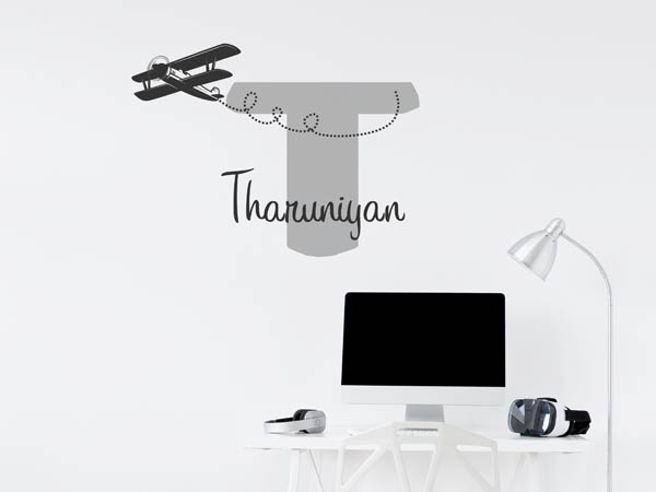 Wandtattoo Tharuniyan mit Flugzeug