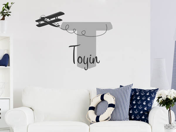 Wandtattoo Toyin mit Flugzeug