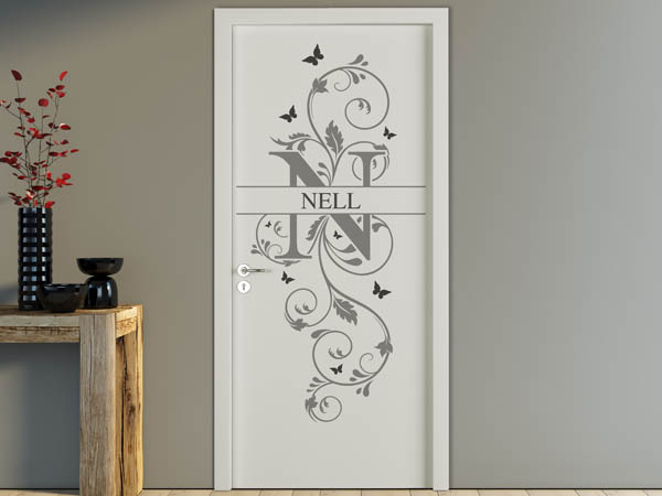 Wandtattoo Namensschild Nell auf einer Tür